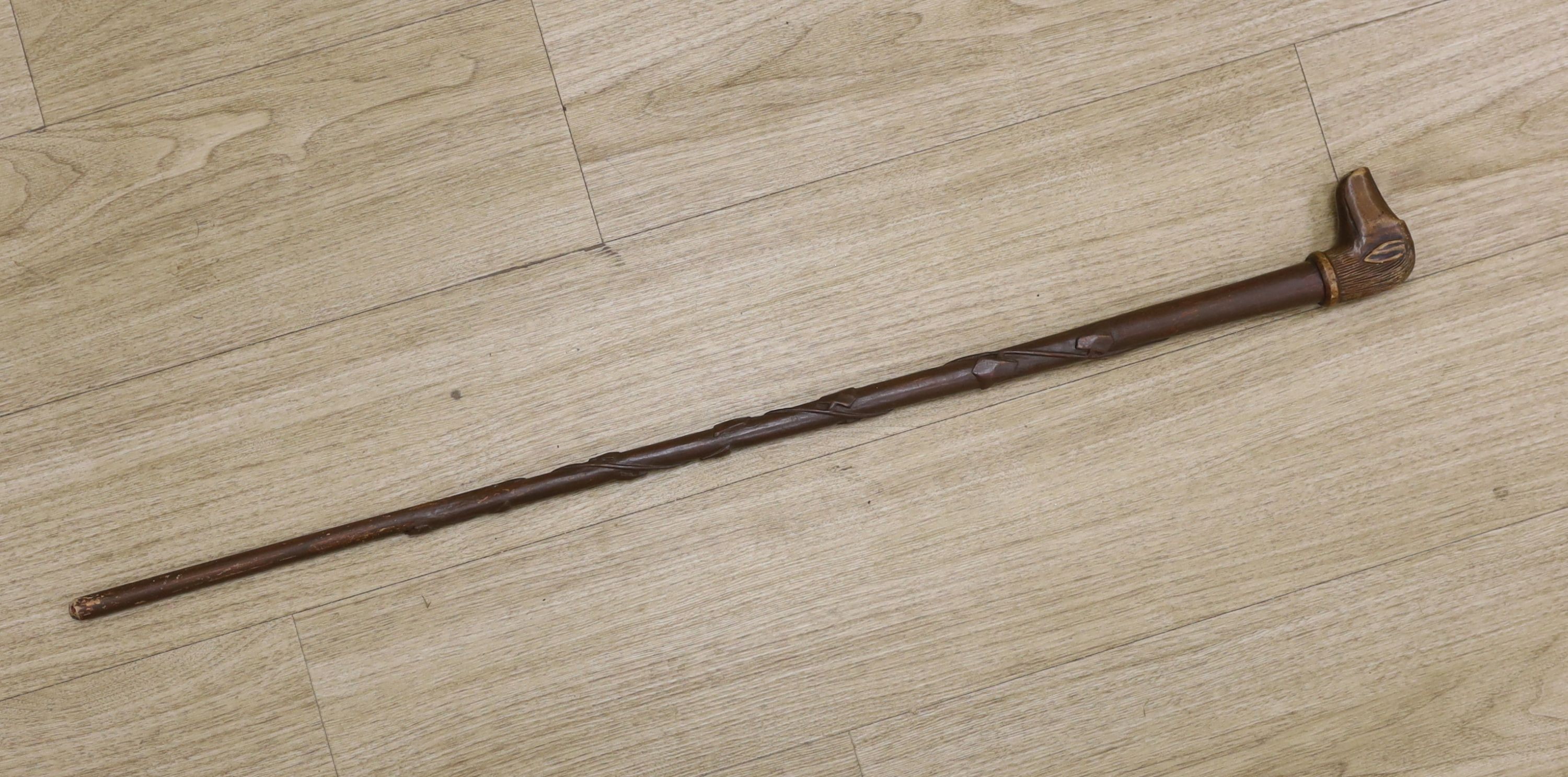 A Folk art carved dog-head walking cane - 92.5cm